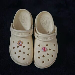 Yellow platform crocs